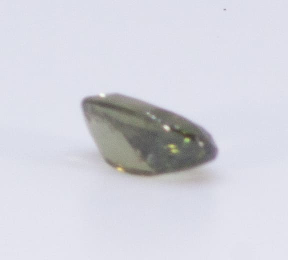 1.5ct Green Garnet Feather Oval Shape (8.9x5.3x3.5 mm) Unheated gemstone from Sri Lanka