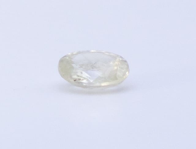 0.6ct Yellow Sapphire Feather Oval Shape (5.8x4.5x2.7 mm) Unheated gemstone from Sri Lanka