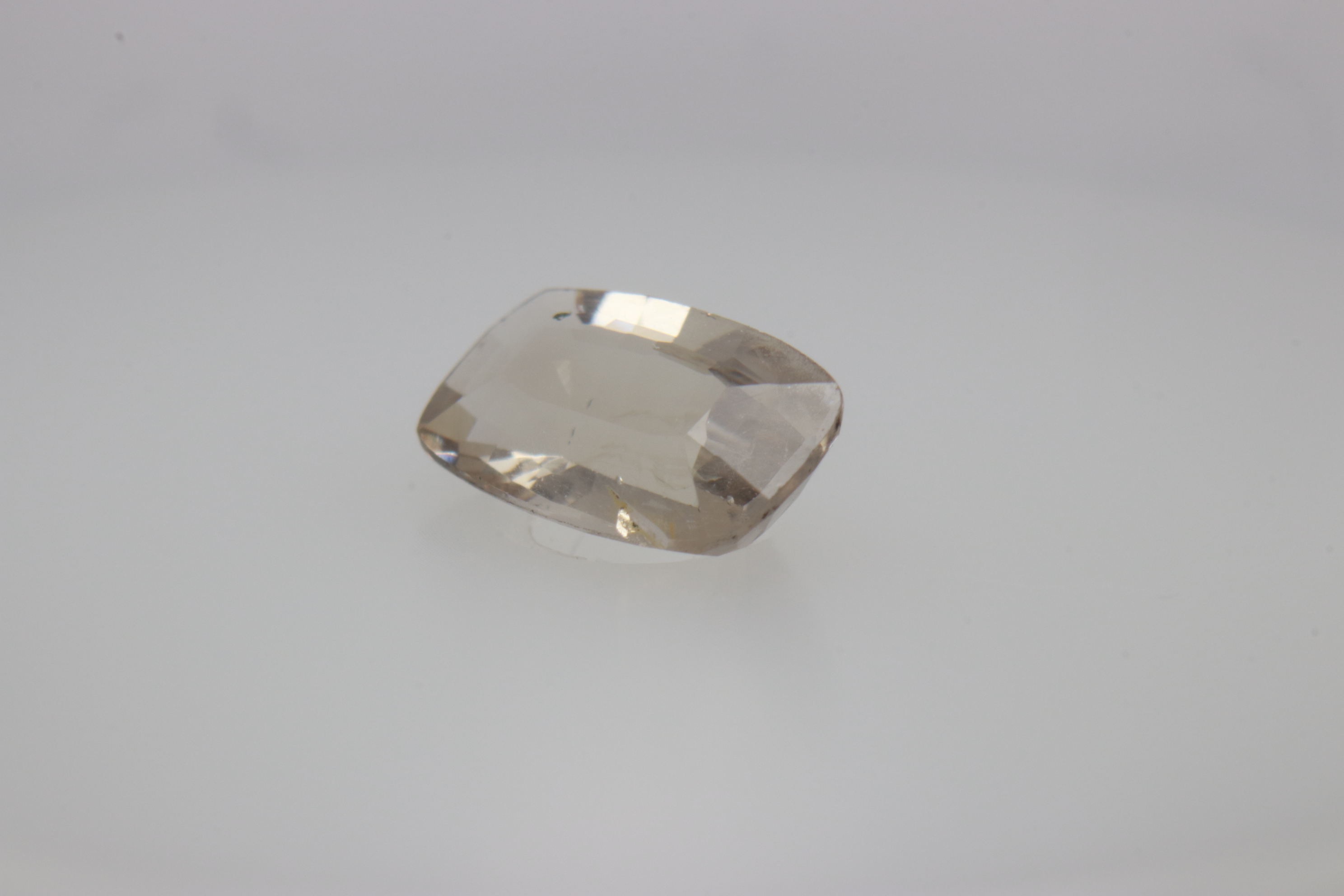 0.7ct White - Off Spinel SI1 Asscher Shape (7.3x4.4x2.8 mm) Unheated gemstone from Sri Lanka