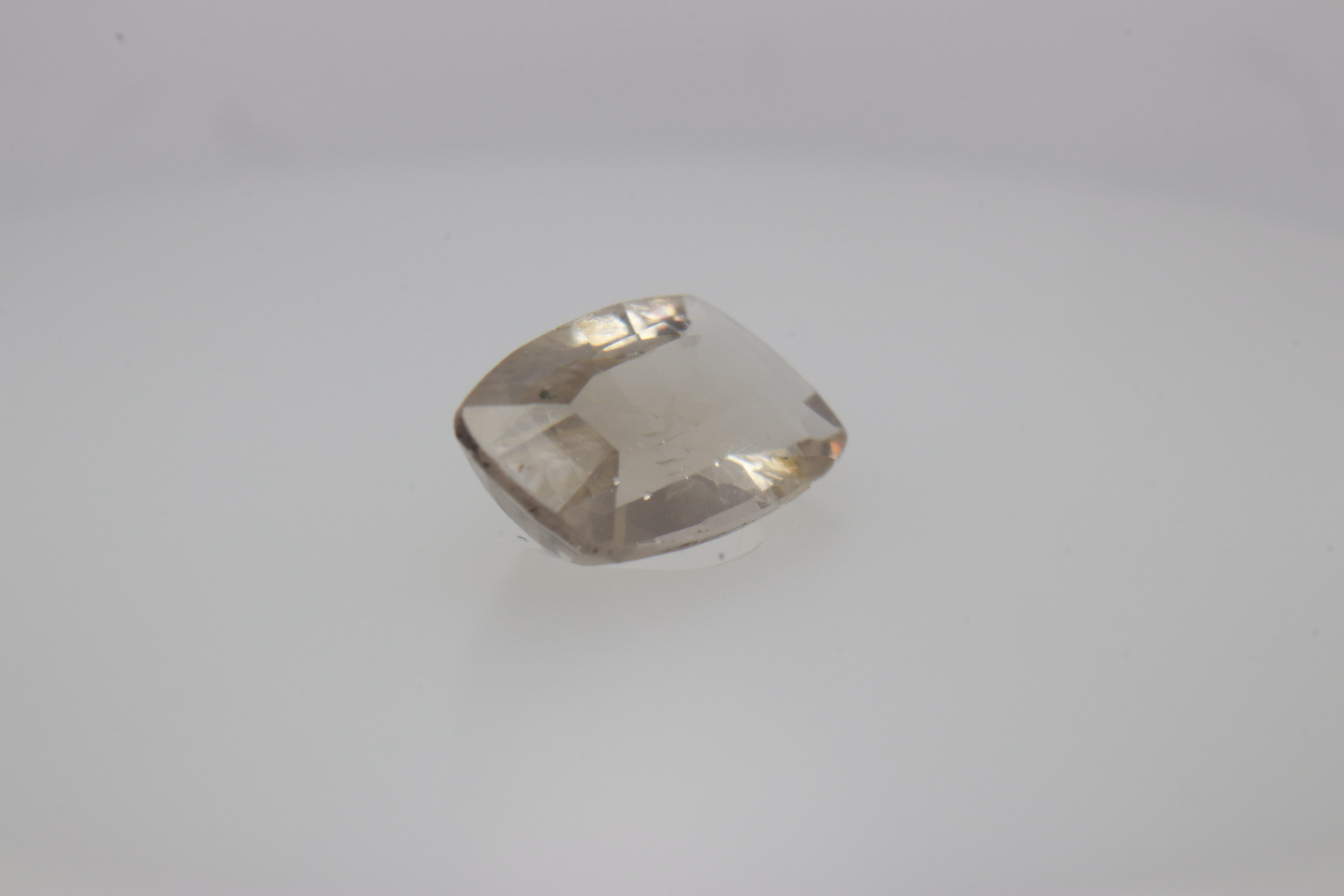 0.7ct White - Off Spinel SI1 Asscher Shape (7.3x4.4x2.8 mm) Unheated gemstone from Sri Lanka