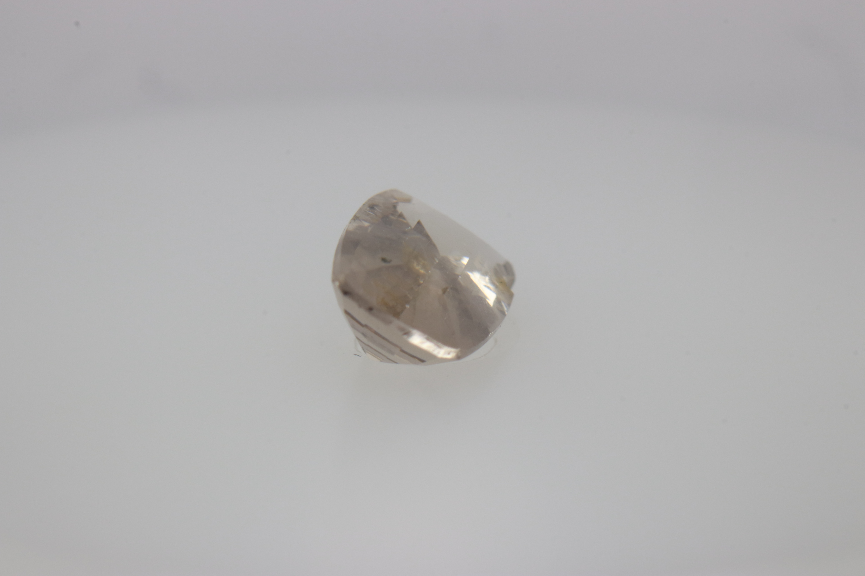0.7ct White - Off Spinel SI1 Asscher Shape (7.3x4.4x2.8 mm) Unheated gemstone from Sri Lanka