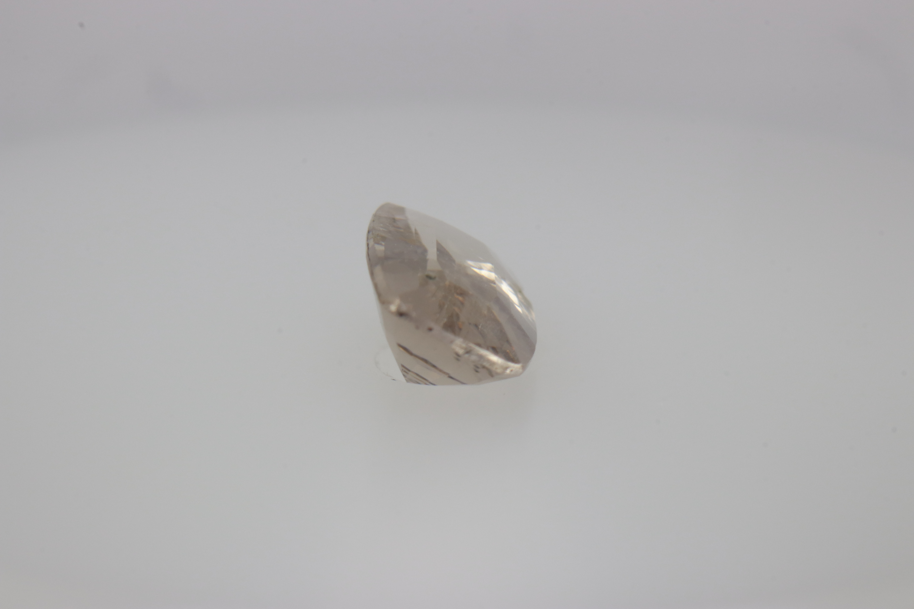 0.7ct White - Off Spinel SI1 Asscher Shape (7.3x4.4x2.8 mm) Unheated gemstone from Sri Lanka