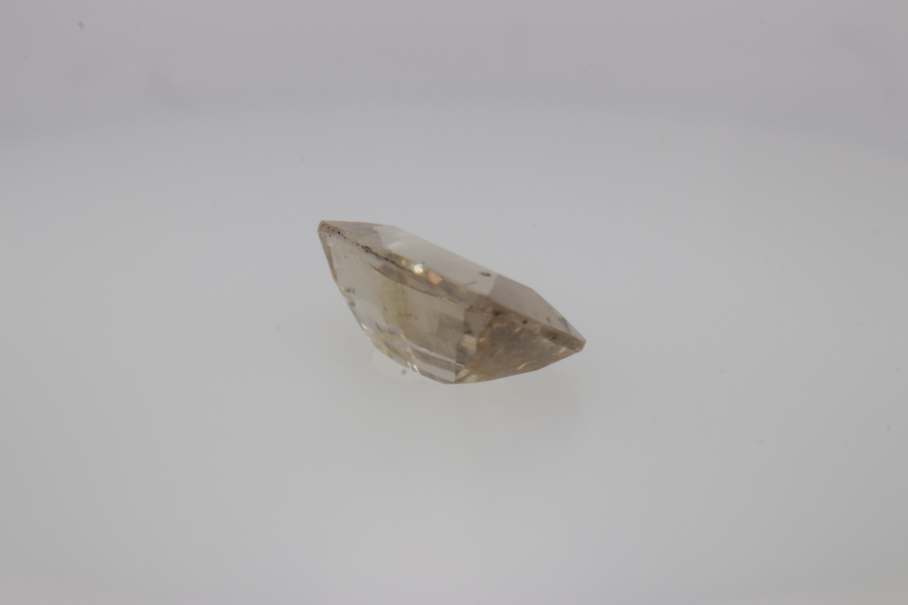 0.7ct White - Off Spinel SI1 Asscher Shape (7.3x4.4x2.8 mm) Unheated gemstone from Sri Lanka
