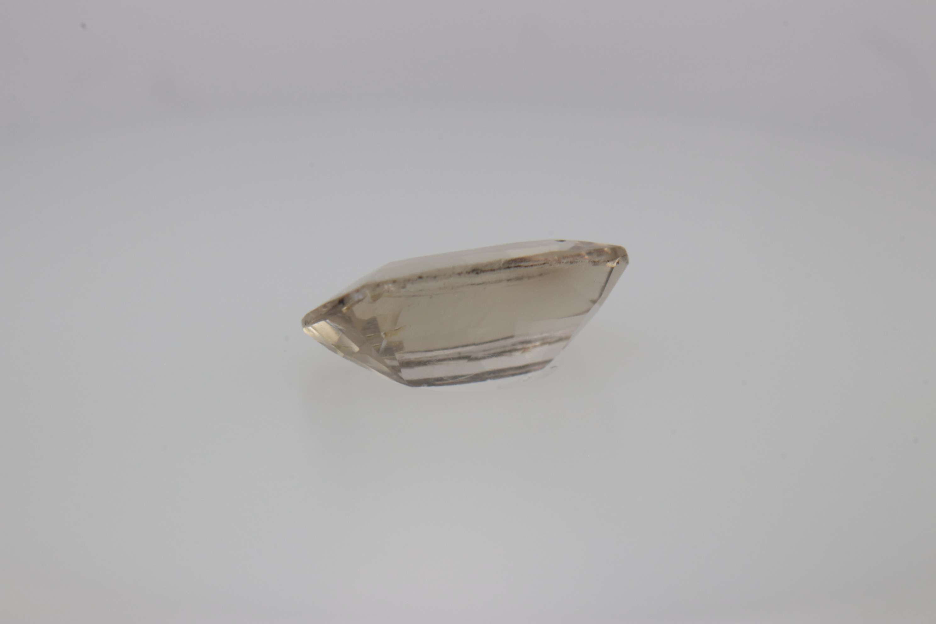 0.7ct White - Off Spinel SI1 Asscher Shape (7.3x4.4x2.8 mm) Unheated gemstone from Sri Lanka