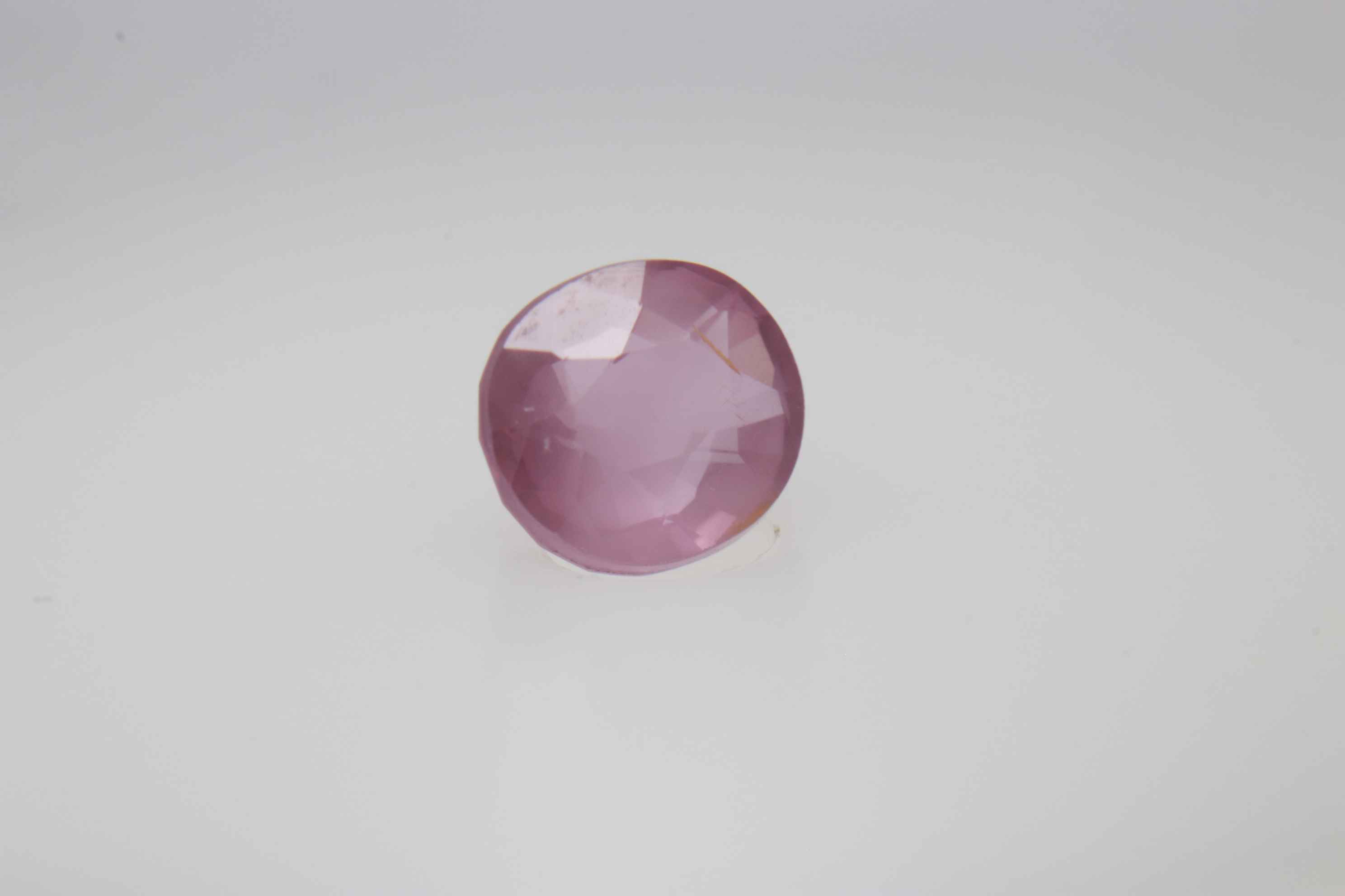 0.6ct Hot Pink Padparadscha VVS Oval Shape (5.2x4.6x3.1 mm) Unheated gemstone from Sri Lanka
