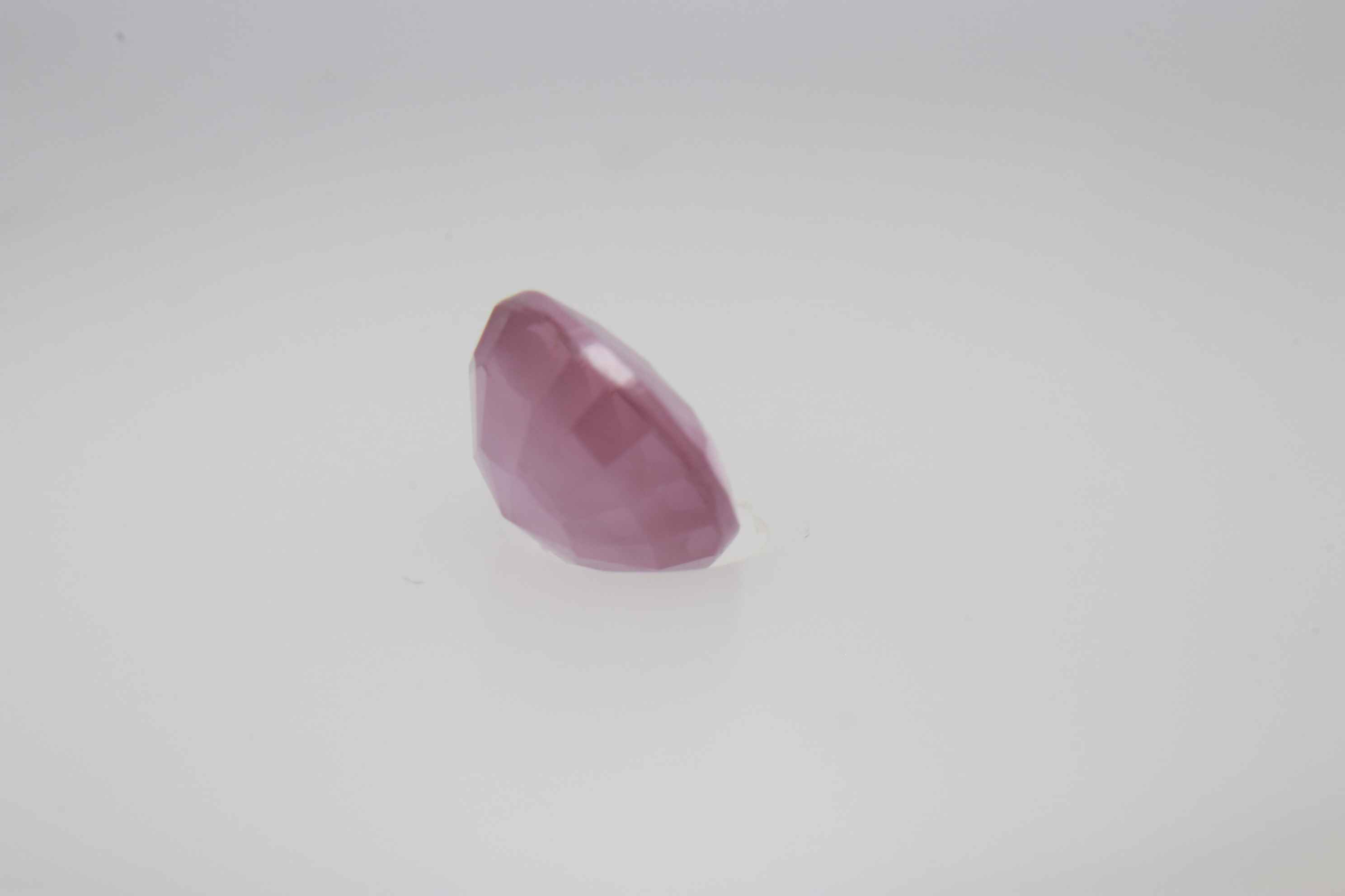 0.6ct Hot Pink Padparadscha VVS Oval Shape (5.2x4.6x3.1 mm) Unheated gemstone from Sri Lanka