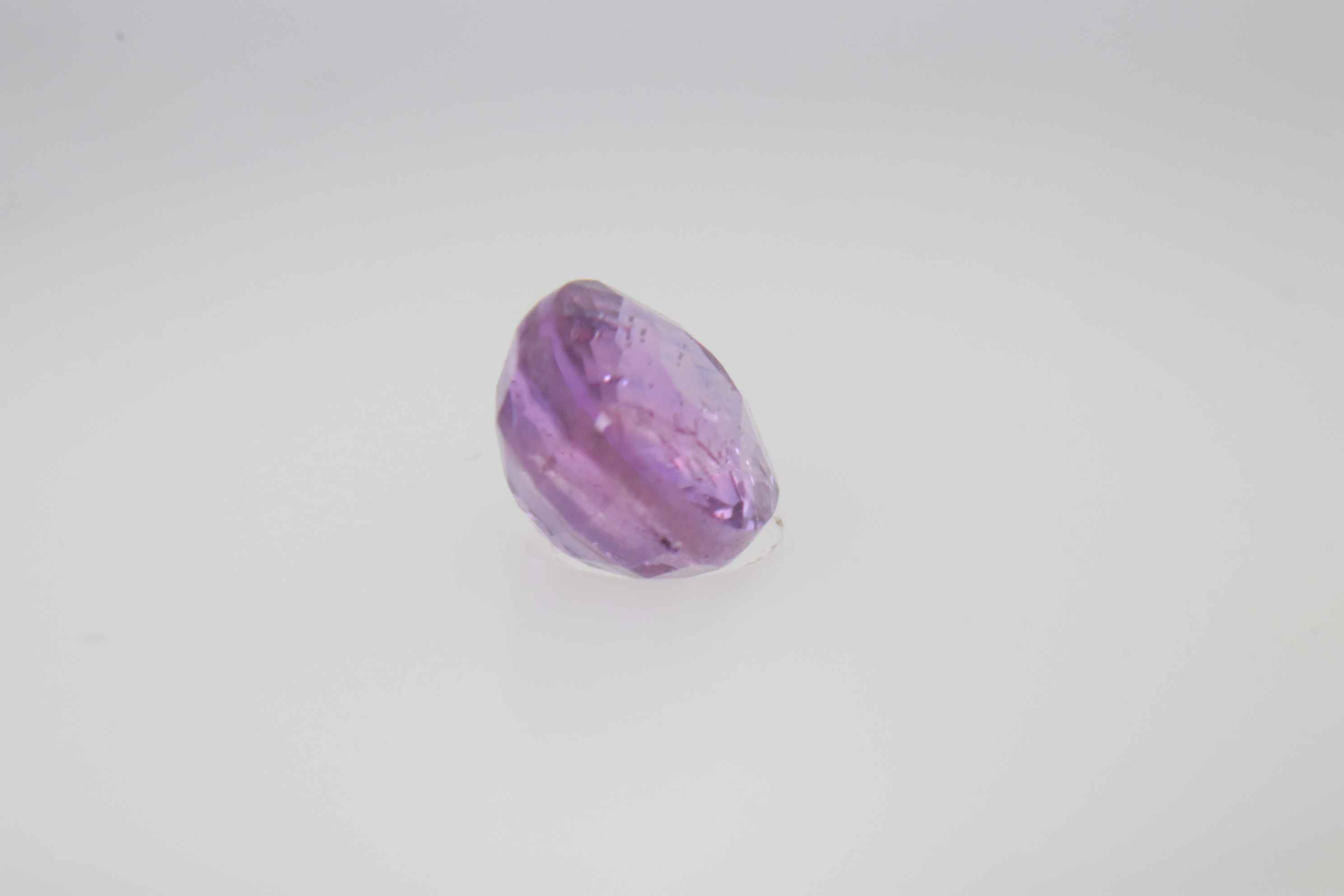 0.9ct Hot Pink Padparadscha VVS Oval Shape (5.8x4.8x3.5 mm) Unheated gemstone from Sri Lanka