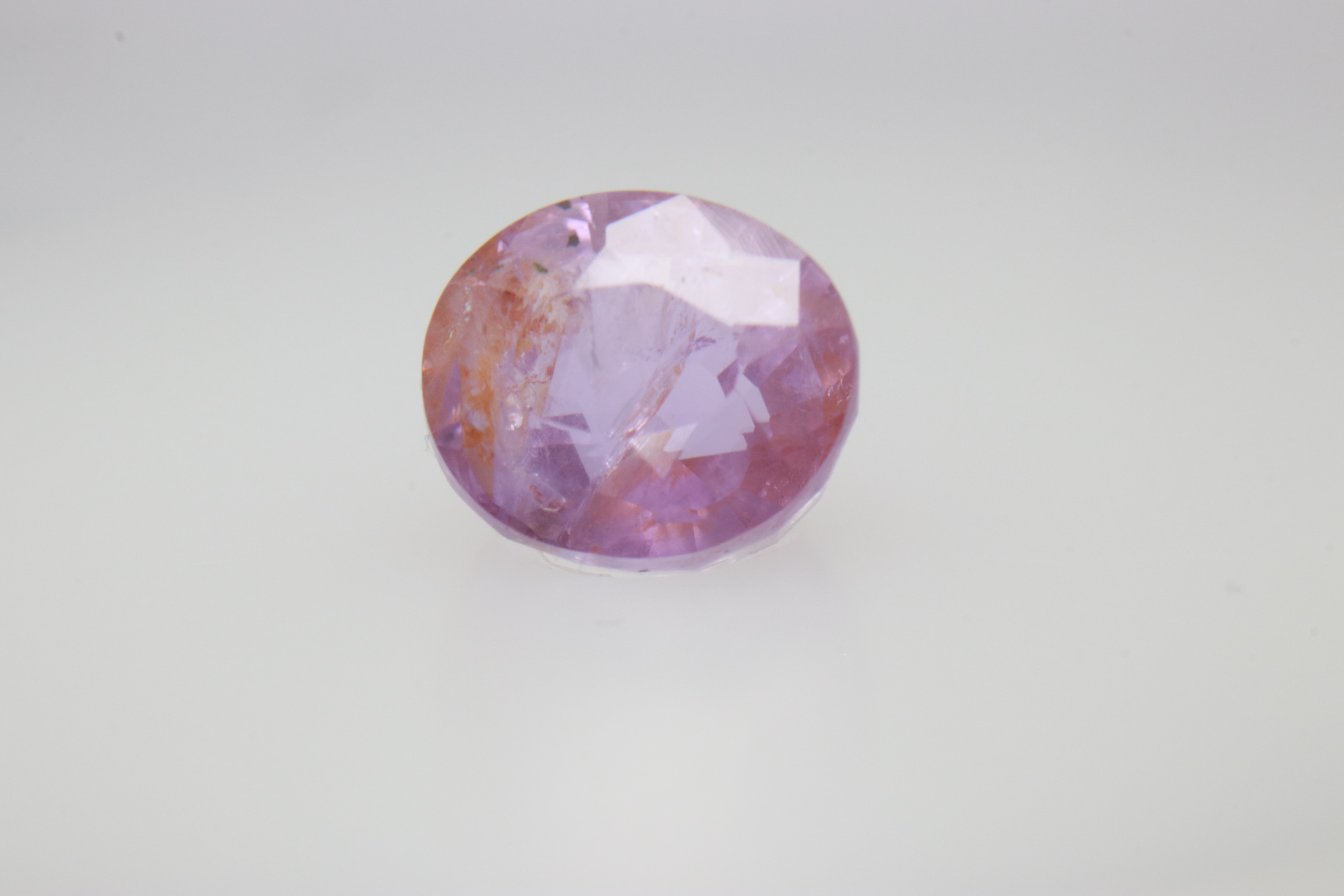 1.6ct Light Pink Padparadscha VVS1 Oval Shape (6.6x5.9x4.2 mm) Unheated gemstone from Sri Lanka