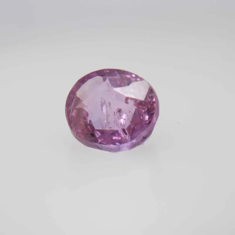 0.9ct Hot Pink Padparadscha VVS Oval Shape (5.8x4.8x3.5 mm) Unheated gemstone from Ceylon