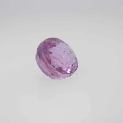 0.9ct Hot Pink Padparadscha VVS Oval Shape (5.8x4.8x3.5 mm) Unheated gemstone from Ceylon