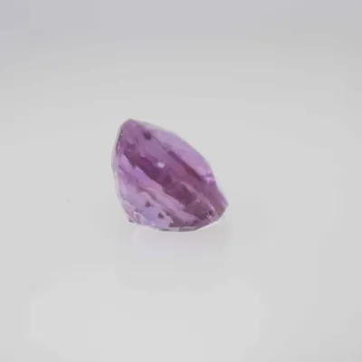 0.9ct Hot Pink Padparadscha VVS Oval Shape (5.8x4.8x3.5 mm) Unheated gemstone from Ceylon