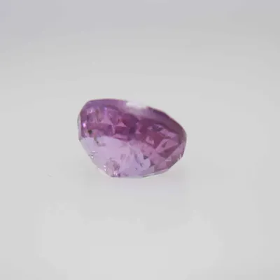 0.9ct Hot Pink Padparadscha VVS Oval Shape (5.8x4.8x3.5 mm) Unheated gemstone from Ceylon